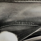 CARTERA GUCCI EN CUERO NEGRO GG