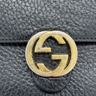 CARTERA GUCCI INTERLOCKING EN CUERO NEGRO VINTAGE