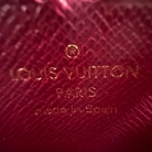 Louis Vuitton monogram canvas wallet with pink interior