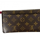 Louis Vuitton monogram canvas wallet with pink interior