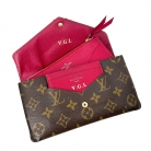 Louis Vuitton monogram canvas wallet with pink interior