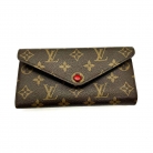 Portafoglio Louis Vuitton Monogram con bottone rosso e accessorio