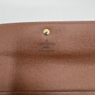 Cartera/billetera Louis Vuitton Monogram marrón con botón