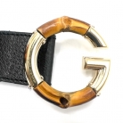 Cinturón Gucci con hebilla G de bambú y lona negra GG