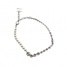 Colgante Chanel perlas