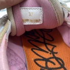Sneakers Versace in rosa e oro