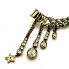 Earcuff Dior in metallo dorato con dettagli pendenti a catena