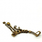 Earcuff Dior in metallo dorato con dettagli pendenti a catena
