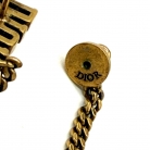 Earcuff Dior in metallo dorato con dettagli pendenti a catena