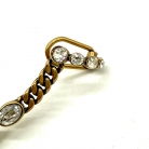 Earcuff Dior in metallo dorato con dettagli pendenti a catena