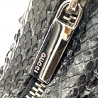 Gucci vintage piel de serpiente en negro.