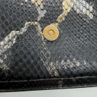 Kate Saint Laurent in pelle di serpente
