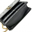 Kate Saint Laurent in pelle di serpente