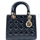 Lady Dior in vernice nera con finiture dorate
