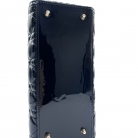 Lady Dior in vernice nera con finiture dorate