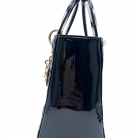 Lady Dior in vernice nera con finiture dorate