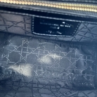 Lady Dior in vernice nera con finiture dorate