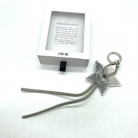 Dior travel keychain