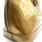 Louis Vuitton Alma PM Vernis dorado