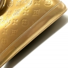 Louis Vuitton Alma PM Vernis dorado