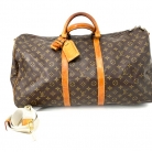 Louis Vuitton Travel Keepall in monogram canvas