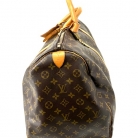 Portaoggetti Louis Vuitton in tela monogram marrone.