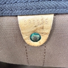 Portaoggetti Louis Vuitton in tela monogram marrone.