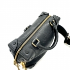 Louis Vuitton Petite Malle Souple in pelle Monogram Empreinte
