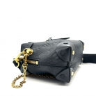 Louis Vuitton Petite Malle Souple in pelle Monogram Empreinte