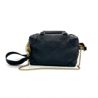 Louis Vuitton Petite Malle Souple in pelle Monogram Empreinte