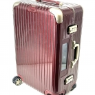 Valigia Rimowa in policarbonato bordeaux con biglietto elettronico