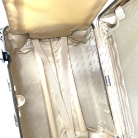 Valigia Rimowa in policarbonato bordeaux con biglietto elettronico