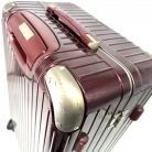 Valigia Rimowa in policarbonato bordeaux con biglietto elettronico