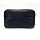 Borsa da toilette Louis Vuitton in pelle stampata nera
