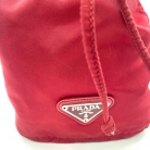 Prada wine-colored nylon toiletry bag