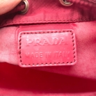 Prada wine-colored nylon toiletry bag