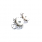 orecchini in oro bianco con diamanti e perla