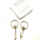 Pendientes Dior circulares y colgantes con perlas