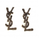 ORECCHINI YSL IN METALLO DORATO