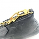Pochette empreinte Louis Vuitton