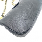 Pochette empreinte Louis Vuitton