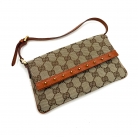 Pochette Gucci en lona GG Supreme