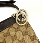 Pochette Gucci en lona GG Supreme