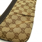 Pochette Gucci en lona GG Supreme