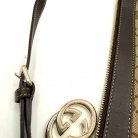Pochette Gucci en lona GG Supreme