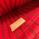 Pochette Louis Vuitton en lona Monogram