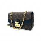 Pochette Métis en Monogram