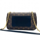 Pochette Métis en Monogram