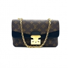 Pochette Métis en Monogram