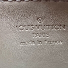 Pochette mostaza charol Louis Vuitton